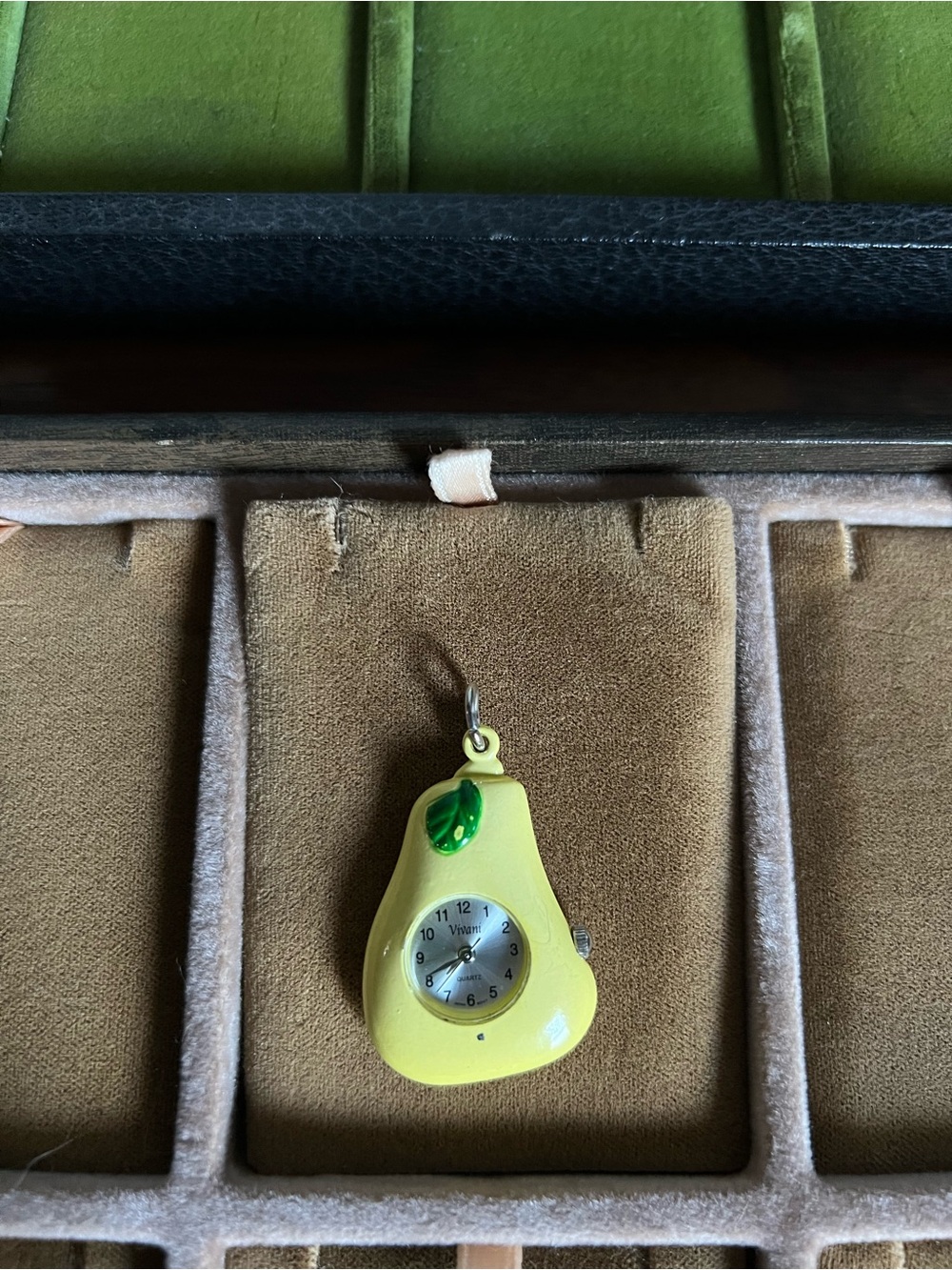 Pear-Shaped Yellow Pendant Watch with Green Leaf Charm